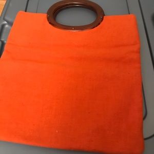 This s a vintage orange bag free of stains